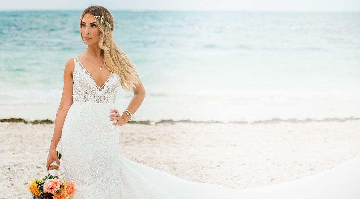 lace wedding dress on the beach from sorelle bridal salon in washington, pennsylvania